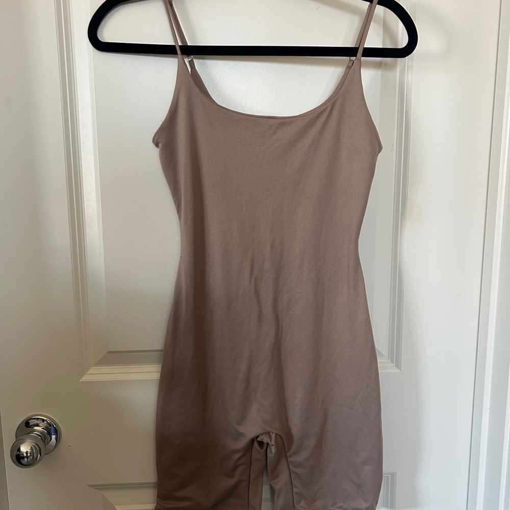 Tan lilyful Romper size medium